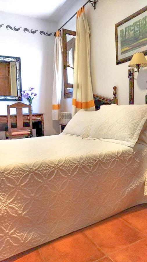 Hostal El Cascapenas De La Alpujarra กาปีเลย์รา ภายนอก รูปภาพ